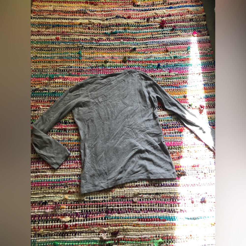 Grey long sleeved woman’s shirt